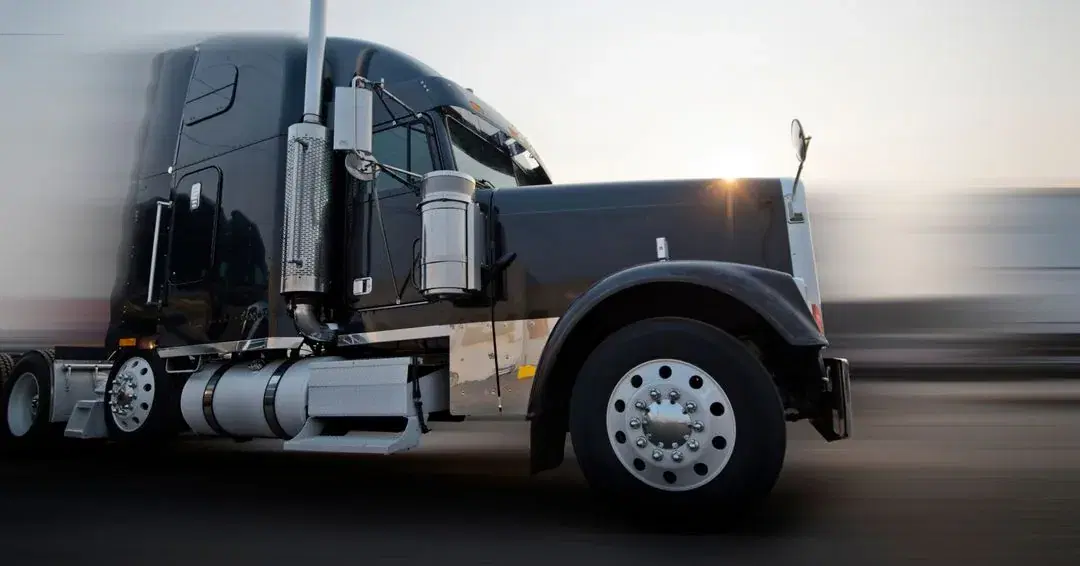 A Paul Transportation tractor travelling at speed.